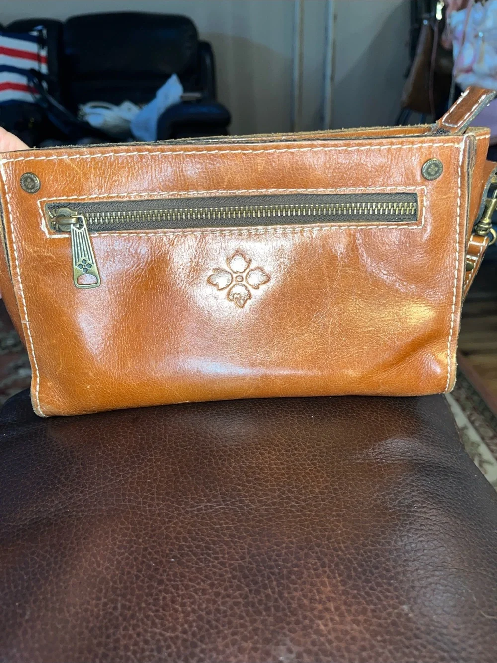 Tan Leather Crossbody Bag with Decorative Embossing